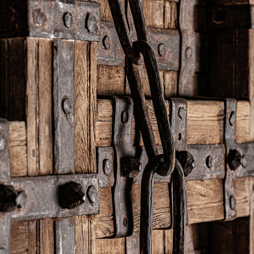 Crafted from aged wood and featuring a natural color and ethnic style, the auxilian Berne Door is a truly unique piece that is sure to make a statement