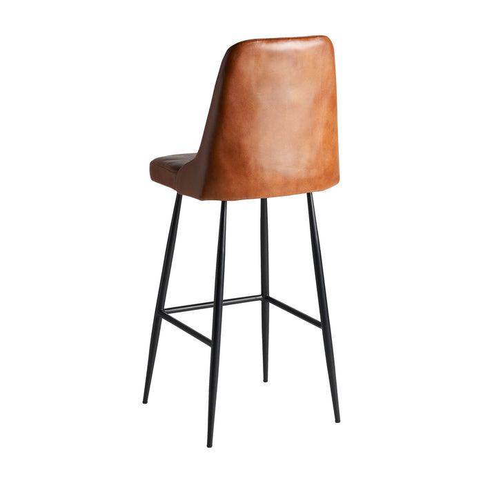 Introducing the Dexter Stool, a charming addition to any vintage-inspired setting. With its warm brown color and classic design, it exudes a sense of nostalgia and timeless appeal
