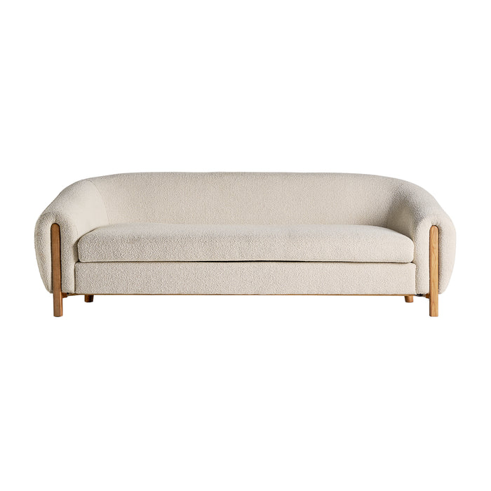 Colonial-style Prati Bouclé Sofa, constructed from a combination of oak wood, rubber wood, and pine wood, features a White & Natural color palette that enhances its aesthetic appeal