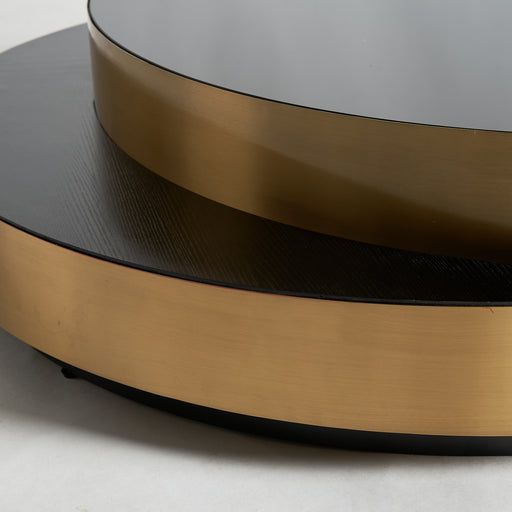 Coffee table Grein, featuring a captivating black and gold color scheme, channels the opulence of the Art Deco style. Skillfully crafted from steel and adorned with a glass top, it effortlessly combines strength with sophistication