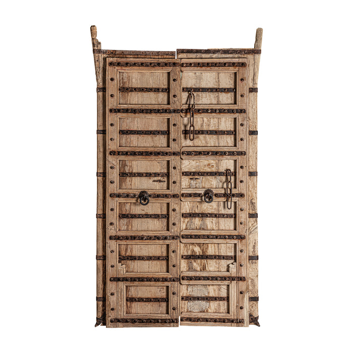 The SACHA Door is a hand-crafted and unique piece that features an Ethnic Style. Made of high-quality Teak Wood in a rich brown color, this door is a beautiful addition to any interior space