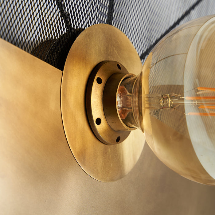 Introducing the sleek and stylish Wall Lamp, perfect for any Art Deco-inspired interior. Featuring a luxurious gold color, this statement piece is crafted from high-quality brass, ensuring durability and longevity