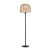 The Rattan Floor Lamp, designed in a Nordic style and available in black and natural colors, is a stunning piece of decor that combines iron with rattan
