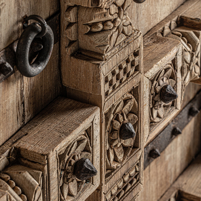 Introducing the exquisite handcrafted Sideboard PHALODI, a stunning piece of natural furniture perfect for any home. The unique ethnic style and natural distressed color create a warm and inviting ambiance