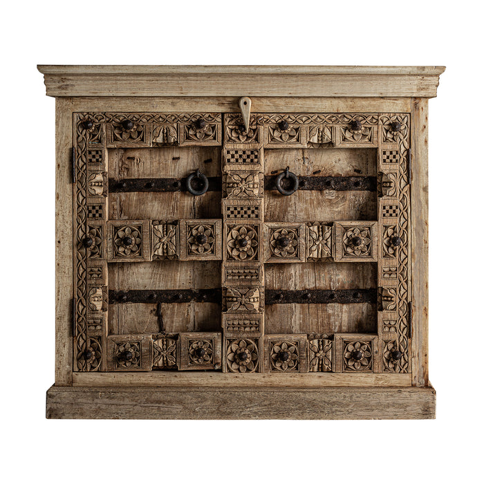 Introducing the exquisite handcrafted Sideboard PHALODI, a stunning piece of natural furniture perfect for any home. The unique ethnic style and natural distressed color create a warm and inviting ambiance