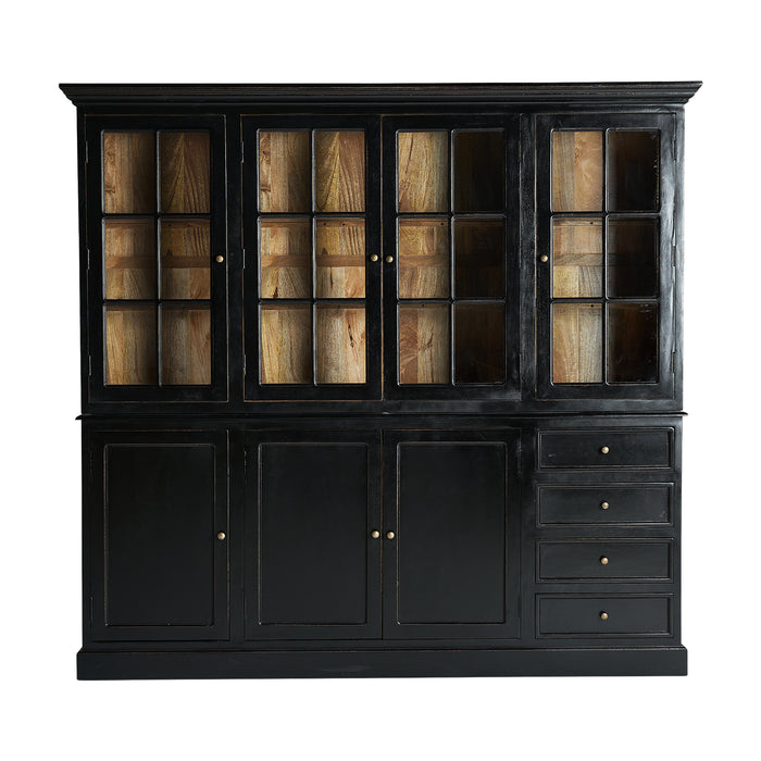 As an interior designer, I would describe the Glass Cabinet ZENICA as a stunning piece of furniture with a bold colonial style that is sure to catch the eye of anyone who enters the room
