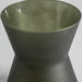 The NEHOIU vase is a stunning addition to any contemporary decor. The sleek and simple design, coupled with the beautiful green color, will make it a standout piece in any room