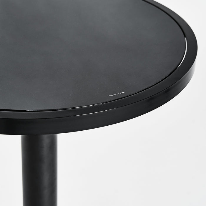 BLACK BAR TABLE DIVION exudes the modern and luxurious design of a chic and sophisticated brand. Its sleek black and shimmering silver color scheme and pristine glass surface are elegant and tasteful